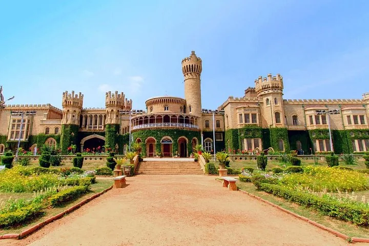 A magnificent palace with towers and well-maintained gardens in front